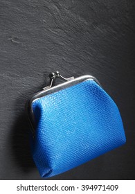 Closed Coin Purse On The Black Slate