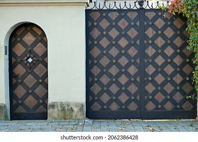 Closed Door And Gate With Metal Trim