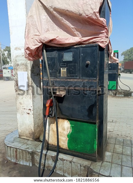 A closed down fuel pump and covered with a\
cover- Karachi Pakistan - Sep\
2020
