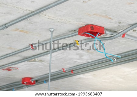 Closed up electtrical conduit installation with cable pulling Stock photo © 