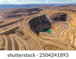 Closed and environmentally remediated mine open pit