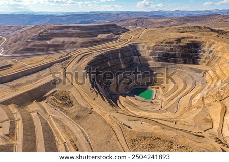 Closed and environmentally remediated mine open pit