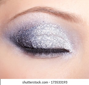 Closed Eye Of Young Woman With Vogue Shining Sparkle Makeup