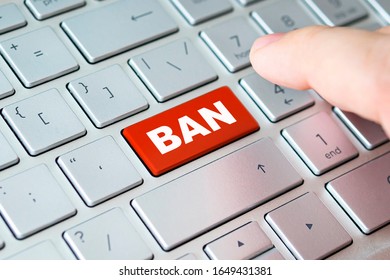 Closed up finger on keyboard with word BAN. The concept of lock, lockout, blocking, locking, blockage, block - Shutterstock ID 1649431381