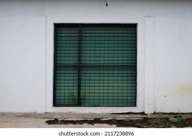 closed garage door behind the house