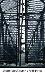 A Closed Gate On A Railroad Overpass