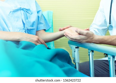 Closed up of Hands of doctor man reassuring woman patient on bed in  hospital .Professional medical doctor comforting patient at consulting room. Medical ethics and trust healthcare concept - Shutterstock ID 1362423722