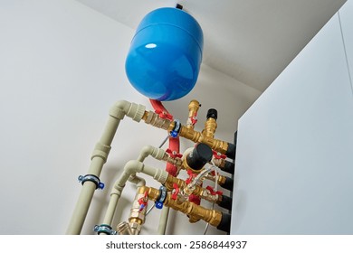 Closed heating system featuring expansion tank, pipes, and shut-off valves, ensuring efficient thermal expansion control
