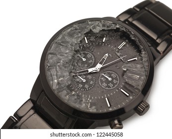 Closed Up Image Of A Broken Wrist Watch Over A White Background