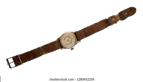 Closed Up Image Of A Broken Wrist Watch Over A White Background