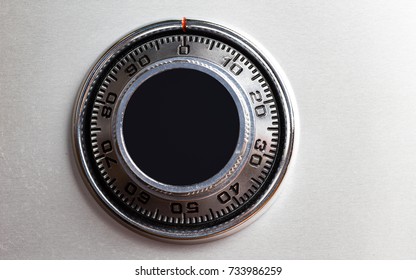 Closed up image of steel safe dial lock.