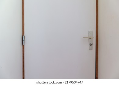 Closed Interior Door With Metal Handle And Lock