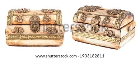 Closed ivory chest close-up. Set of chests on white background isolated: front view, side view.