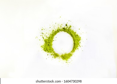 Closed Up Macro Object, Isolate Heap Of Circle Extracted Green Tea Powder Object White Background. This Is Best Natural Ingredients Are Extract From Dry Green Tea Leave From Plantation.