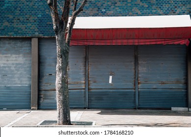 Closed metal shutter door of building. Japanese street view - Powered by Shutterstock