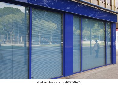 Closed office in the street, in blue tones