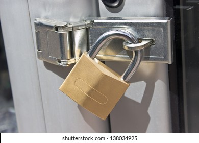 Closed Padlock On  A Metal Door