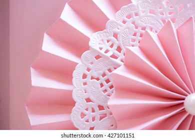 Closed up of pink circle shape folding paper for decorated the backdrop
