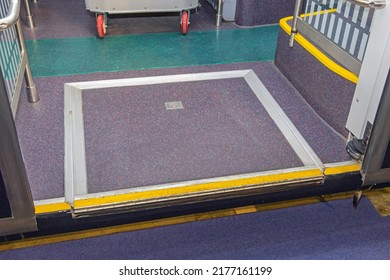 Closed Ramp At Public Transport Bus For Wheelchair User Access