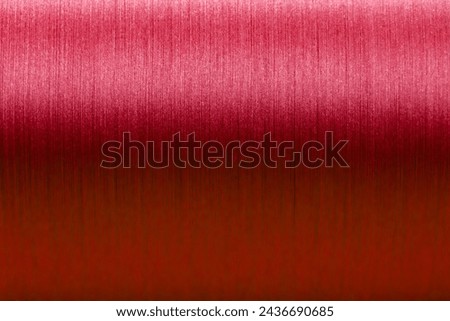 Closed up of red color of thread textured background (Focus at center of picture)
