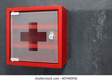 Closed Red Metal Empty Medicine Cabinet Hanging On A Dark Gray Marble Wall Background. Perspective View