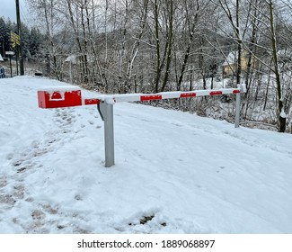 Closed Road Barrier In Winter.