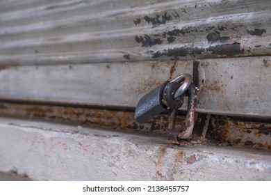 Closed Shop Shutter And Padlock. Economic Crises And Bankruptcies.