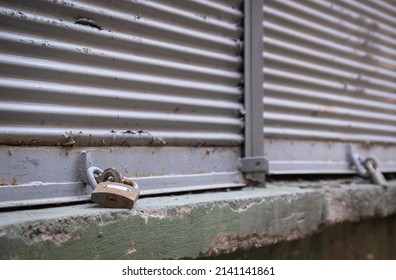 Closed Shop Shutter And Padlock. Economic Crises And Bankruptcies.	