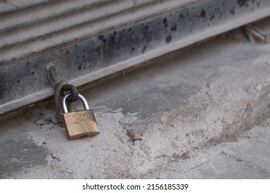 Closed Shop Shutter And Padlock. Economic Crises And Bankruptcies.