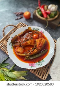 A Closed Up Shot Of Asam Pedas Ikan Pari. Asam Pedas Is A Minangkabau And Malay Sour And Spicy Fish Stew Dish. It Is Popular In Indonesia And Malaysia, Selective Focus.