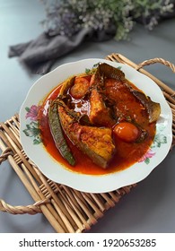 A Closed Up Shot Of Asam Pedas Ikan Pari. Asam Pedas Is A Minangkabau And Malay Sour And Spicy Fish Stew Dish. It Is Popular In Indonesia And Malaysia, Selective Focus.