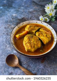 A Closed Up Shot Of Asam Pedas Ikan Pari. Asam Pedas Is A Minangkabau And Malay Sour And Spicy Fish Stew Dish. It Is Popular In Indonesia And Malaysia, Selective Focus.