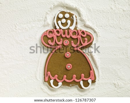 Similar – Image, Stock Photo Gingerbread girl cookie and little boy cookie. Christmas concept