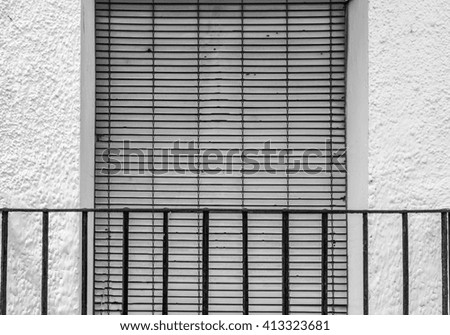 Similar – Two windows with closed shutters