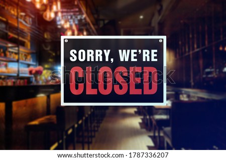 Closed sign of a bar or pub. Concept of Closure, suspension, or bankruptcy of a bar, restobar or pub.