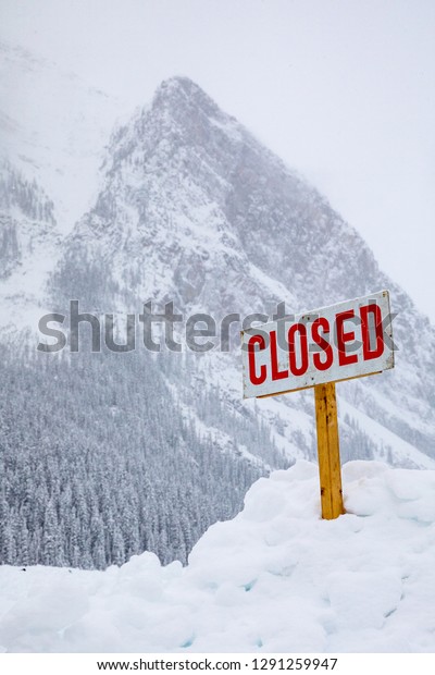 Closed Sign. Closed due\
to bad weather.