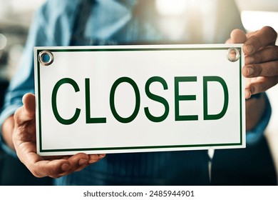 Closed, sign and hands of small business owner for coffee shop, service industry and end of work day notification. Person, signage or board for restaurant closing with sorry, bankruptcy and inflation - Powered by Shutterstock