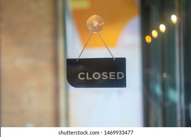 closed sign hanging outside a restaurant, store, office or other - Shutterstock ID 1469933477