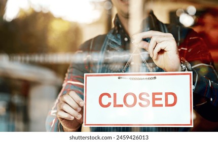 Closed, sign and man at door of cafe for small business, information and notification of service. Coffee shop, waiter and person with board by window for hospitality, restaurant and end of work day - Powered by Shutterstock