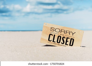 Closed sign on tropical sand beach with blue sky background. Summer vacation and travel holiday concept. Vintage tone fitler effect color style. - Shutterstock ID 1750701824