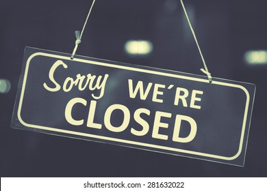 Closed sign in a shop window - Shutterstock ID 281632022