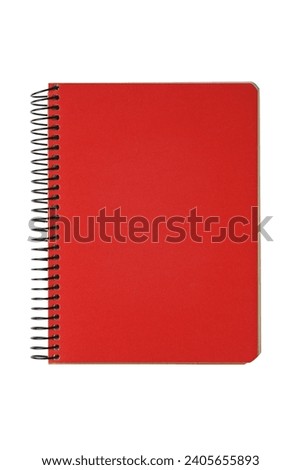 Closed spiral bound notepad with red cover isolated on white background. Top view, copy space for text, template, mockup.