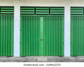 Closed steel rolling door with green color