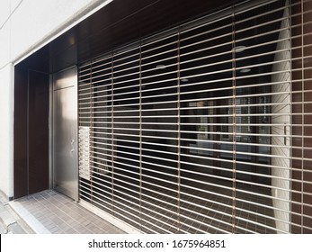 A Closed Store With Closed Shutters. Shot In Tokyo.