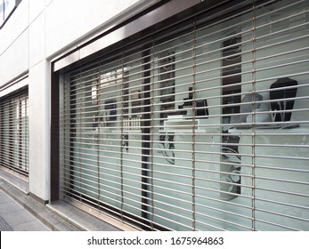 A Closed Store With Closed Shutters. Shot In Tokyo.