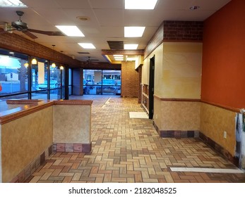 Closed Subway in a plaza in the evening - Interior from left side of building (Longmont, Colorado, USA) - 03\06\2021