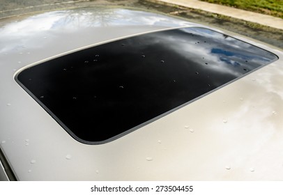 Closed Sun Roof With Some Raindrops Of The Modern Car