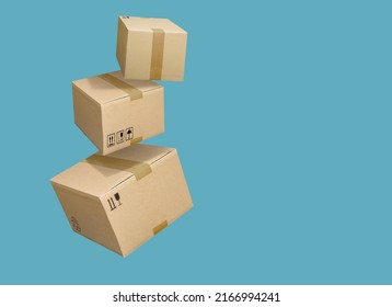 Closed and taped cardboard boxes flying isolated on turquoise blue background - Shutterstock ID 2166994241
