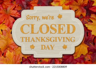 Closed Thanksgiving Day Sign With Red And Orange Fall Leaves