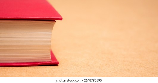 Closed Thick Red Book Pages Side View Simple Abstract Wide Banner Background, Copy Space, Nobody. Literature, Literacy Reading And Education Concept, No People. Generic Book Object Detail, Closeup